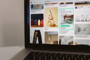 Pinterest homepage on laptop showing how to earn money from Etsy by driving search traffic to product listings in 2026